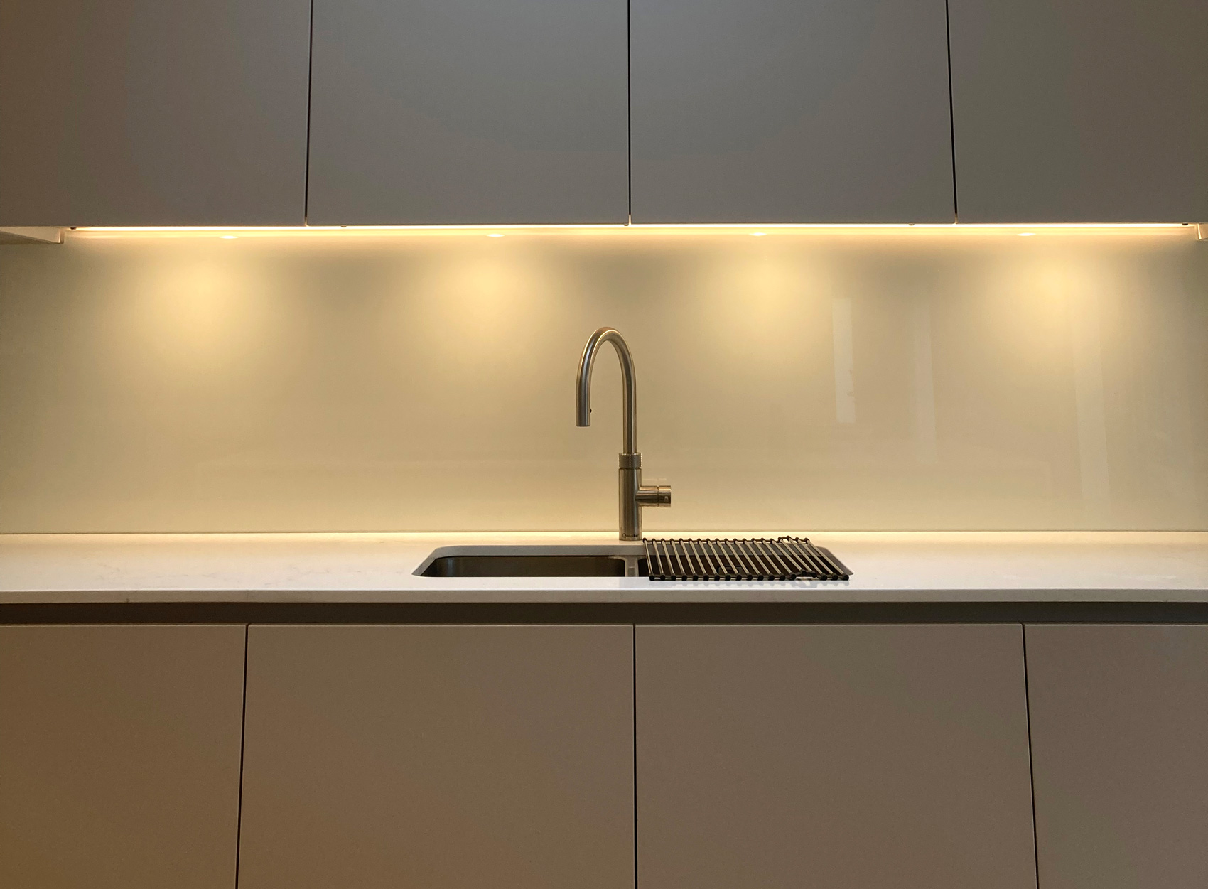 Kitchen sink and units with concealed lighting